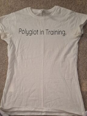 Gildan White "Polyglot in Training." Short Sleeve Tee